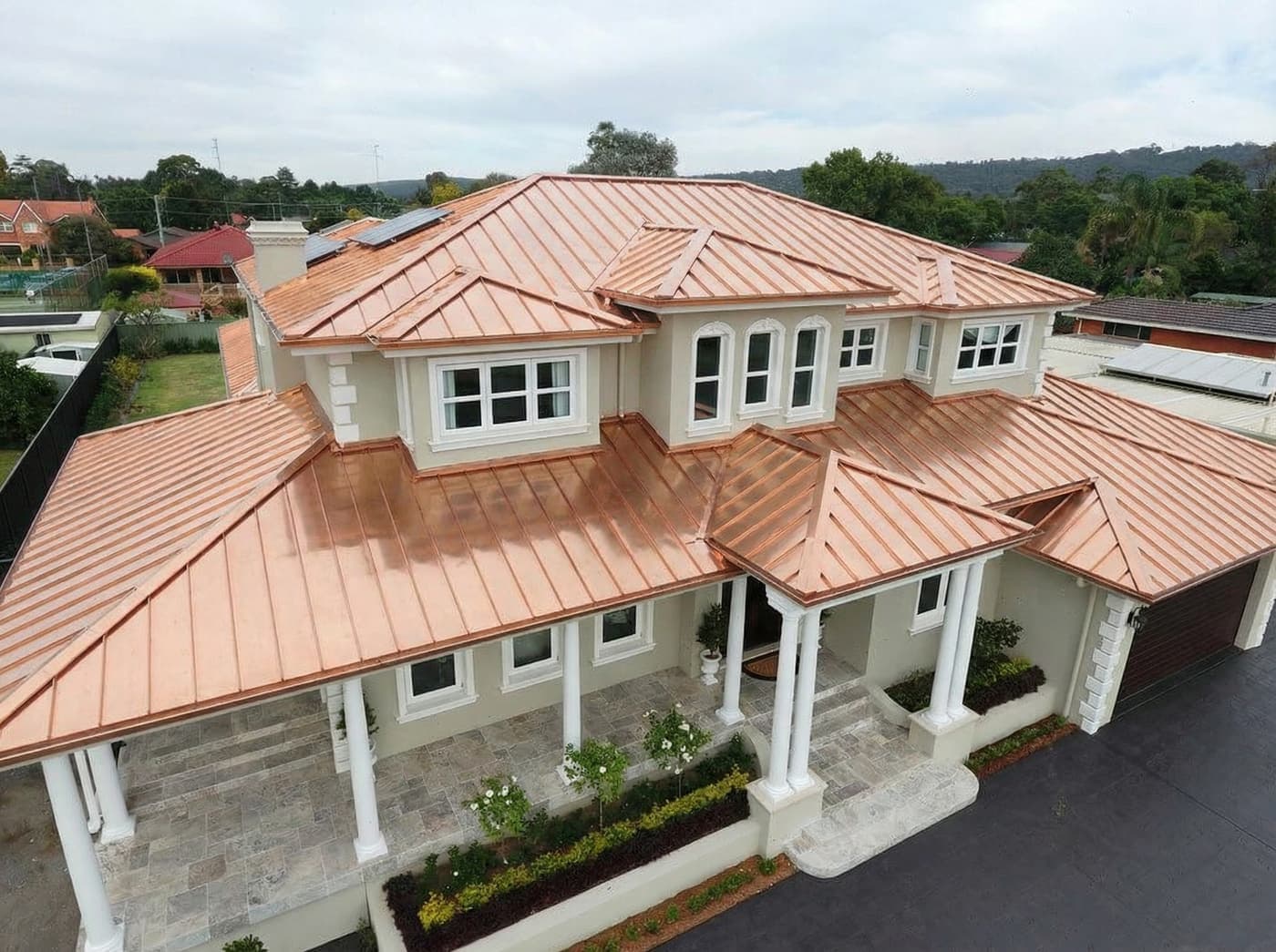 After: Black shingle to copper